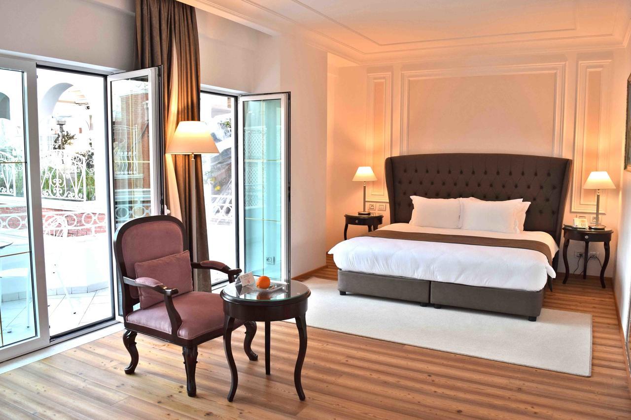 Xheko Imperial Luxury Boutique Hotel Tirana Extérieur photo A bedroom at the hotel