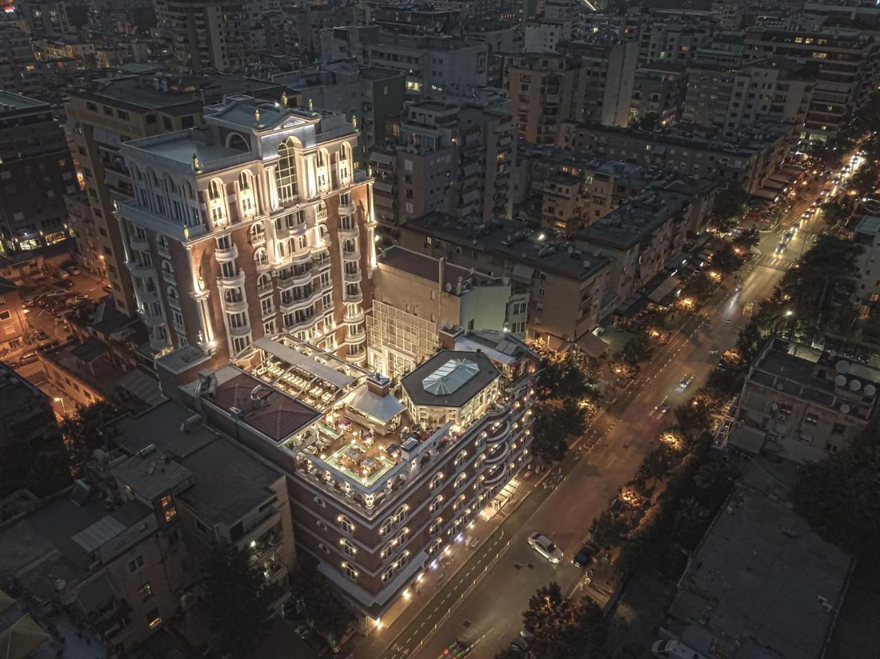 Xheko Imperial Luxury Boutique Hotel Tirana Extérieur photo The hotel at night